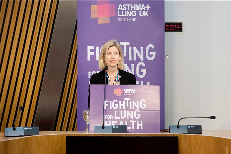 Sarah Woolnough talking to cross-party MSP's supporting Asthma and Lung UK in the Scottish Parliament