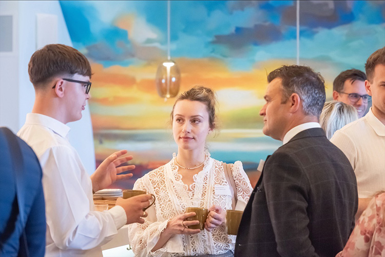 Edinburgh Camber of Commerce event at Johnnie Walker Edinburgh, Business meeting in Explorers Bothy, people with coffee, talking