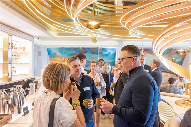 Edinburgh Camber of Commerce event at Johnnie Walker Edinburgh, Business meeting in Explorers Bothy, people with coffee, talking