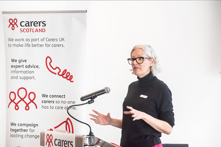 Kirsten Hogg, Director of Devolved Nations at Carers Scotland speaking at Carers Scotland Annual Summit 2026
